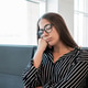 Tired woman waiting in airport lounge feeling sleepy Tired woman waiting in airport lounge feeling sleepy - PhotoDune Item for Sale