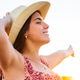 Happy woman experiencing freedom during golden hour sunset Happy woman experiencing freedom during golden hour sunset - PhotoDune Item for Sale