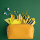 Yellow pencil case bursting with school supplies and stationery Yellow pencil case bursting with school supplies and stationery - PhotoDune Item for Sale