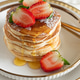 Stack of Golden Pancakes with Strawberry and Coffee on White Tablecakes with Strawberries and Coffe Stack of Golden Pancakes with Strawberry and Coffee on White Tablecakes with Strawberries and Coffe - PhotoDune Item for Sale