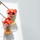 Two glasses of refreshing fruit salad with strawberries and kiwi Two glasses of refreshing fruit salad with strawberries and kiwi - PhotoDune Item for Sale