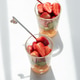 Two glasses of refreshing fruit salad preparing for consumption Two glasses of refreshing fruit salad preparing for consumption - PhotoDune Item for Sale