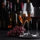 Three glasses of red, white and sparkling rose wine with bunch of grapes on dark slate background Three glasses of red, white and sparkling rose wine with bunch of grapes on dark slate background - PhotoDune Item for Sale