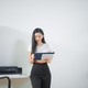 Asian businesswoman working from home on a cozy sofa, reviewing documents in a modern living room wi Asian businesswoman working from home on a cozy sofa, reviewing documents in a modern living room wi - PhotoDune Item for Sale