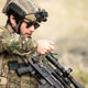 Military marksman aiming through a scoped rifle during tactical training exercise Military marksman aiming through a scoped rifle during tactical training exercise - PhotoDune Item for Sale