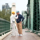 Senior LGBTQ couple walking together on a historic bridge in Bangkok, Thailand Senior LGBTQ couple walking together on a historic bridge in Bangkok, Thailand - PhotoDune Item for Sale