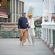 Senior LGBTQ couple enjoying a leisurely walk along a riverside promenade in Bangkok, Thailand Senior LGBTQ couple enjoying a leisurely walk along a riverside promenade in Bangkok, Thailand - PhotoDune Item for Sale