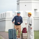 Senior LGBTQ travelers with luggage exploring Bangkok, Thailand Senior LGBTQ travelers with luggage exploring Bangkok, Thailand - PhotoDune Item for Sale