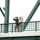 Senior LGBTQ couple relaxing on a historic steel bridge in Bangkok, Thailand Senior LGBTQ couple relaxing on a historic steel bridge in Bangkok, Thailand - PhotoDune Item for Sale