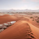 Red sand dunes with footprints in Namib desert Red sand dunes with footprints in Namib desert - PhotoDune Item for Sale