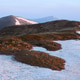 Sunrise in spring mountains with snow-capped hills Sunrise in spring mountains with snow-capped hills - PhotoDune Item for Sale