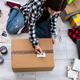 Girl Packing Cardboard Boxes And Takes Photos Girl Packing Cardboard Boxes And Takes Photos - PhotoDune Item for Sale