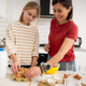 Happy Little Girl And Mother Baking In The Kitchen Happy Little Girl And Mother Baking In The Kitchen - PhotoDune Item for Sale