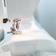 Close View of Sewing Machine Working on Fabric Close View of Sewing Machine Working on Fabric - PhotoDune Item for Sale