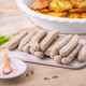 Small raw German sausages, Nuremberg sausages prepared for baking or grilling Small raw German sausages, Nuremberg sausages prepared for baking or grilling - PhotoDune Item for Sale