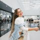 Customer Smiling and Leaning on Railing in Mall Customer Smiling and Leaning on Railing in Mall - PhotoDune Item for Sale