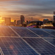 Solar panels in a modern city at sunset highlighting clean energy and urban sustainability. Solar panels in a modern city at sunset highlighting clean energy and urban sustainability. - PhotoDune Item for Sale