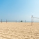 Horizontal wide shot of empty beach volleyball nets set up on the wide sandy shore of Santa Monica B Horizontal wide shot of empty beach volleyball nets set up on the wide sandy shore of Santa Monica B - PhotoDune Item for Sale