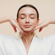Young beautiful woman doing face building yoga self massage with hands. Facial gymnastics and rejuve Young beautiful woman doing face building yoga self massage with hands. Facial gymnastics and rejuve - PhotoDune Item for Sale