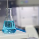 Laboratory with glassware tube reactors and colorful liquids in testing processes. Laboratory with glassware tube reactors and colorful liquids in testing processes. - PhotoDune Item for Sale
