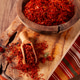 Spice saffron threads, in a wooden bowl, on a wooden table, top view, close-up, Spice saffron threads, in a wooden bowl, on a wooden table, top view, close-up, - PhotoDune Item for Sale