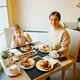 Mother and son enjoying breakfast at hotel in firenze Mother and son enjoying breakfast at hotel in firenze - PhotoDune Item for Sale