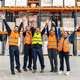 Diverse warehouse workers teamwork celebrating logistics success Diverse warehouse workers teamwork celebrating logistics success - PhotoDune Item for Sale