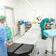 Medical professionals preparing operating room for surgery Medical professionals preparing operating room for surgery - PhotoDune Item for Sale