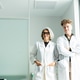 Healthcare professionals standing in clinic showing teamwork and expertise Healthcare professionals standing in clinic showing teamwork and expertise - PhotoDune Item for Sale