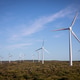 Wind turbines generating renewable energy blue sky Wind turbines generating renewable energy blue sky - PhotoDune Item for Sale