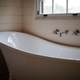 Elegant Freestanding Bathtub Next To Window Elegant Freestanding Bathtub Next To Window - PhotoDune Item for Sale