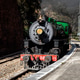 Vintage steam locomotive on sunny day railway track Vintage steam locomotive on sunny day railway track - PhotoDune Item for Sale