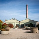 Historic Industrial Building With Tall Chimney Historic Industrial Building With Tall Chimney - PhotoDune Item for Sale