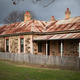 Historic Stone House Under Overcast Sky Historic Stone House Under Overcast Sky - PhotoDune Item for Sale