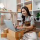 Young entrepreneur managing an online store by processing customer orders, using a laptop, recording Young entrepreneur managing an online store by processing customer orders, using a laptop, recording - PhotoDune Item for Sale