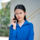 Asian businesswoman seriously talking to smartphone at outside building Asian businesswoman seriously talking to smartphone at outside building - PhotoDune Item for Sale