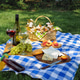 Summer picnic on green grass with wine, grapes, cheese and peaches Summer picnic on green grass with wine, grapes, cheese and peaches - PhotoDune Item for Sale