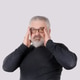 Mature bearded man adjusting eyeglasses and looking at camera isolated on gray backgroundОписание Mature bearded man adjusting eyeglasses and looking at camera isolated on gray backgroundОписание - PhotoDune Item for Sale