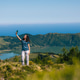 Woman hiking in sete cidades taking selfie Woman hiking in sete cidades taking selfie - PhotoDune Item for Sale