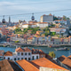 Teleferico de Gaia cable car with Douro boats near the riverside quays Teleferico de Gaia cable car with Douro boats near the riverside quays - PhotoDune Item for Sale