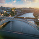 Sunrise drone view of tram on Dom Luis I Bridge with old town skyline Sunrise drone view of tram on Dom Luis I Bridge with old town skyline - PhotoDune Item for Sale