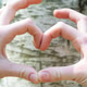 Fingers Folded in the Shape of a Heart Symbolizing Concern for the Planet's Ecological Environment Fingers Folded in the Shape of a Heart Symbolizing Concern for the Planet's Ecological Environment - PhotoDune Item for Sale