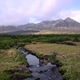 Flowing stream in Connemara valley near Lough Inagh Galway Ireland with rugged mountains, lush green Flowing stream in Connemara valley near Lough Inagh Galway Ireland with rugged mountains, lush green - PhotoDune Item for Sale