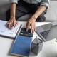 Man working on financial reports and business data analytics at home office. Man working on financial reports and business data analytics at home office. - PhotoDune Item for Sale