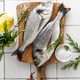 Fresh raw dorado fish cooking with ingredients. Sea bream, dorado. Seafood, healthy food. Top view Fresh raw dorado fish cooking with ingredients. Sea bream, dorado. Seafood, healthy food. Top view - PhotoDune Item for Sale