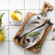 Fresh raw dorado fish cooking with ingredients. Sea bream, dorado. Seafood, healthy food. Top view Fresh raw dorado fish cooking with ingredients. Sea bream, dorado. Seafood, healthy food. Top view - PhotoDune Item for Sale
