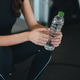 Woman water bottle gym hand holding water bottle after exercise in fitness center Woman water bottle gym hand holding water bottle after exercise in fitness center - PhotoDune Item for Sale