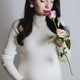 Hip-length portrait of beautiful pregnant Caucasian girl in knitted dress with pink rose. Hip-length portrait of beautiful pregnant Caucasian girl in knitted dress with pink rose. - PhotoDune Item for Sale