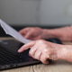 Senior woman paying bills online using laptop Senior woman paying bills online using laptop - PhotoDune Item for Sale