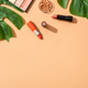 Summer make up background. Shadow palette, lipstick, serum bottle with palm leaves. Summer make up background. Shadow palette, lipstick, serum bottle with palm leaves. - PhotoDune Item for Sale